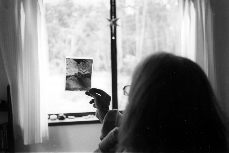 Rae looking at pinhole neg', Quinninup, 2011 - © John Austin